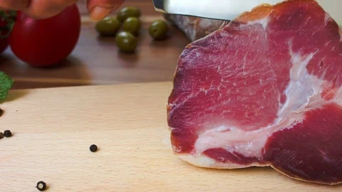 Jerked meat sliced with a knife Stock Footage 71897573