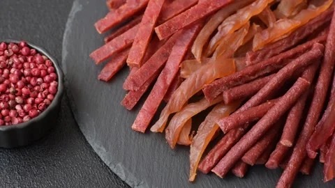 Jerky, dried fish in the form of sticks with salt, spices and herbs Stock Footage 302339237