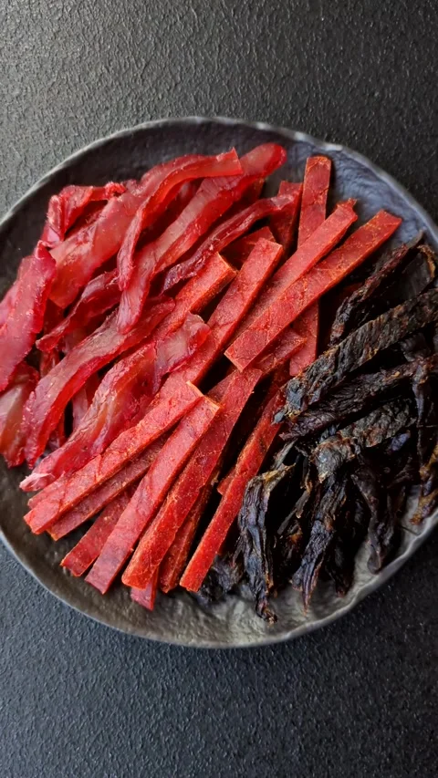 Jerky, dried fish in the form of sticks with salt, spices and herbs Stock Footage 302339438