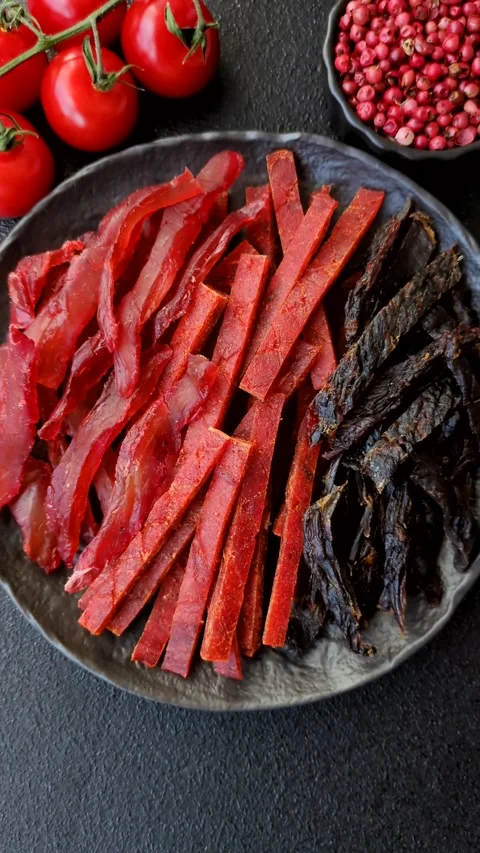 Jerky, dried fish in the form of sticks with salt, spices and herbs Stock Footage 302339462