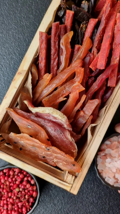 Jerky, dried fish in the form of sticks with salt, spices and herbs Stock Footage 303442650