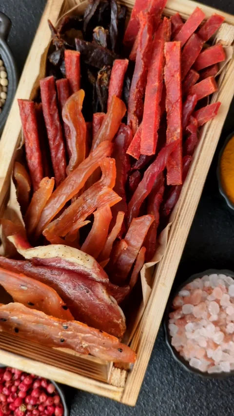Jerky, dried fish in the form of sticks with salt, spices and herbs Stock Footage 303442651