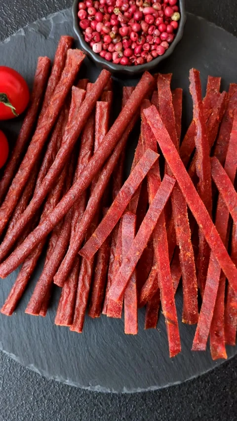 Jerky dried fish sticks with salt and spices Stock Footage 302116769