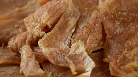 Jerky, dried meat with spices, 4K footage, rotating, close up Stock Footage 86409788