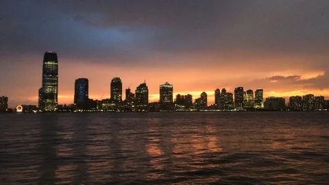 Jersey City Skyline and Hudson River at Sunset Stock Footage