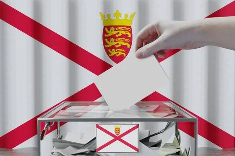 Jersey flag, hand dropping ballot card into a box - voting/ election concept  Stock-Illustration