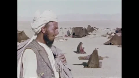 JERUSALEM - 1968 - A scriptural scholar studies ancient religious texts from Stock Footage 259549168