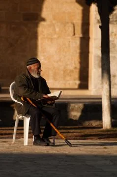 Jerusalem, December 2012: Elderly man prays at the Mount Temple in Jerusalem, Stock Photos