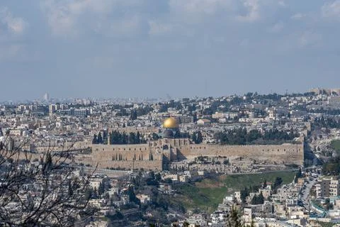 Jerusalem of Gold under cloudy sky - old town view from Mount of Olives. Jeru Stock Photos