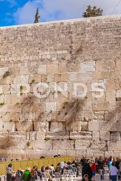 JERUSALEM, ISRAEL - FEBRUARY 17, 2013: People praying near Western Wall Stock Photos