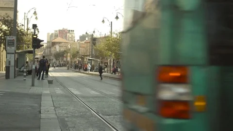 Jerusalem: jaffa street, bus passing and reveal the light train station Stock Footage 85113873