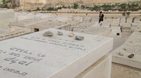 Jerusalem Mount of Olives Graveyard with praying Jew.mxf Stock Footage 65020280