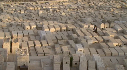 Jerusalem Mount of Olives Graveyard with praying Jew.mxf Stock Footage 65021493