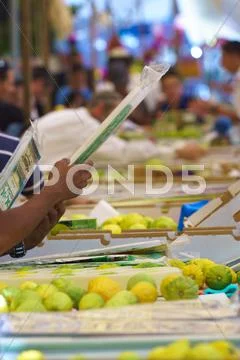 JERUSALEM - OCTOBER 7, 2014: Religious Jews at a lulav market place, Israel Stock Photos