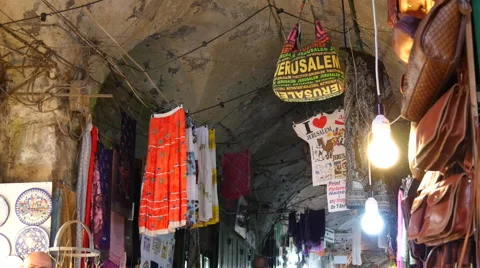 Jerusalem. Pan down from Jerusalem bags to the old city street Stock Footage 47228596