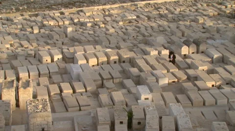 Jerusalem's Mount of Olives Graveyard with a praying Jew Stock Footage 65020465