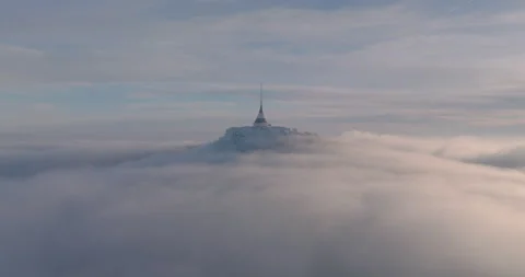 Jested tower mountain hill with snow mist and fog at golden hour Stock Footage 231565541