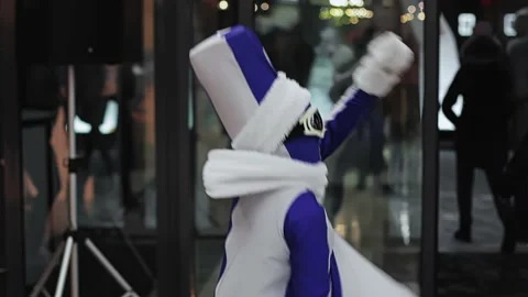 Jester dressed up as snowman dances at event show. Animator in funny costume Video stock 217442151