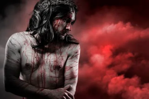 Jesus christ over red cloudscape, calvary concept Stock Photos