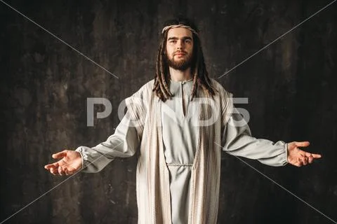 Jesus Christ praying with open arms ~ Hi Res #88744193