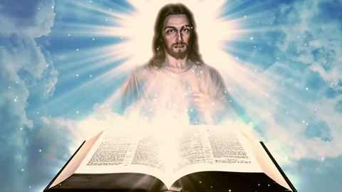 Jesus Christ in the sky while Holy Bible is in the foreground Seamless loop Vidéo 124910994