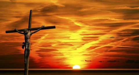 Jesus on the Cross at Sunset Stock Photos