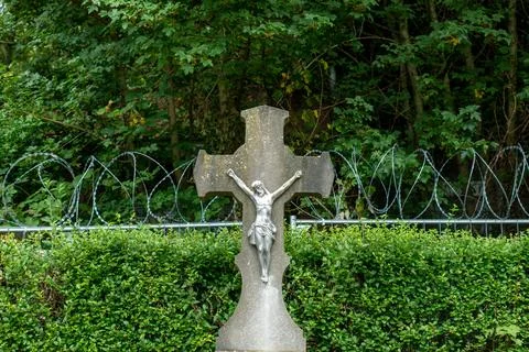 Jesus in graveyard with barbed wire Stock Photos