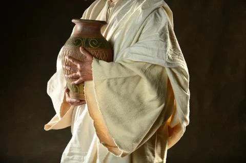 Jesus hands holding jar Stock Photos
