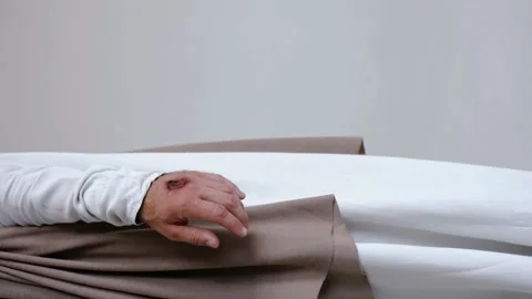 Jesus' hands with stigmata on a white background. Studio. Video stock 160496276