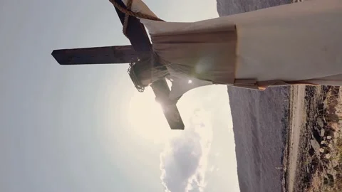 Jesus hangs on the cross, the wind is blowing, the sun is shining. Crucifixion. 스톡 동영상 160496412