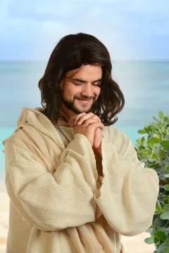 Jesus praying by the sea Stock Photos