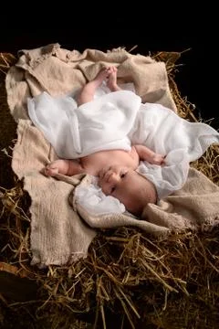 Jesus Resting on a Manger Stock Photos