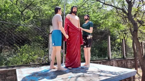 Jesus Statue - Clothes Stripping - Rightwards Shot Video stock 263308998