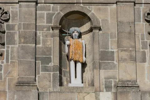 Jesus statue on a facade Stock Photos