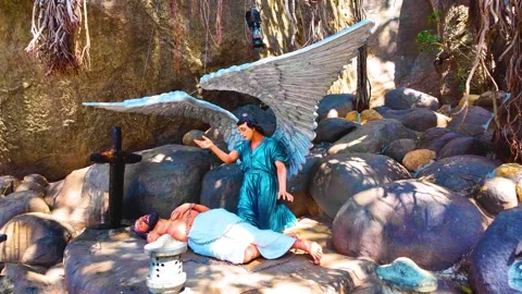 Jesus Statue - Jesus on Ground - Leftwards Shot Stock Footage 263325410