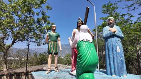 Jesus Statue - Wiping of Tears - Orbiting Shot Stock Footage 263298748