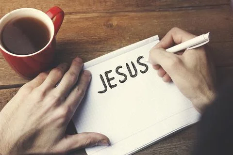 Jesus text on page Stock Photos