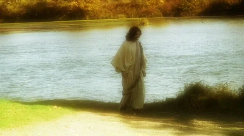 Jesus walks by river Stock Footage 362682