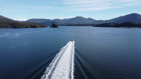 Jet boat making high speed starboard turn 4K drone Stock Footage 172419212