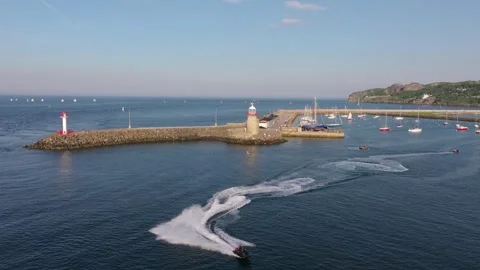 Jet Boat Turning Inside Breakwater at Howth Pier Entrance Stock Footage 339640218