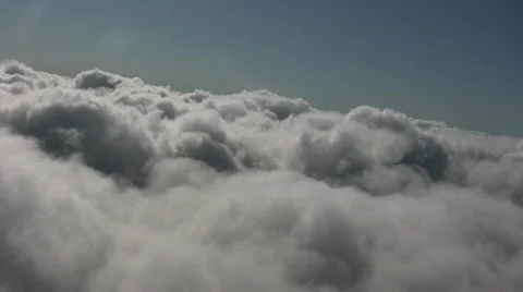 Jet breaks through clouds as it gets ready to land Stock Footage 271685