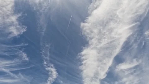 Jet Contrail Through Clouds Stock Footage 251606606