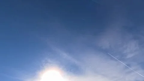 Jet Contrail Through Clouds Stock Footage 261340536