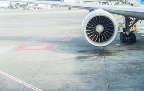 Jet engine of Air plane with runway background Stock Photos