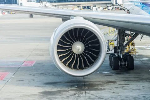 Jet engine of Air plane with runway background Stock Photos
