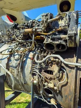 A jet engine is displayed, highlighting its internal components and wiring on Stock Photos