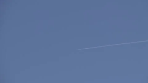 Jet far in the sky 11sec Stock Footage 255149870