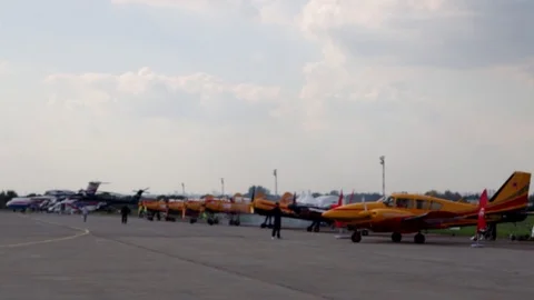 A jet fighter makes a figure "Barrel Snap Aileron Roll" at an air show. A group Stock Footage 125285996