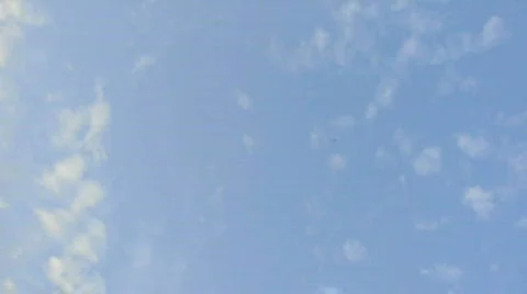 Jet flies by frame far away Stock Footage 695538