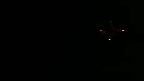 Jet flies over Lisbon Stock Footage 77654706